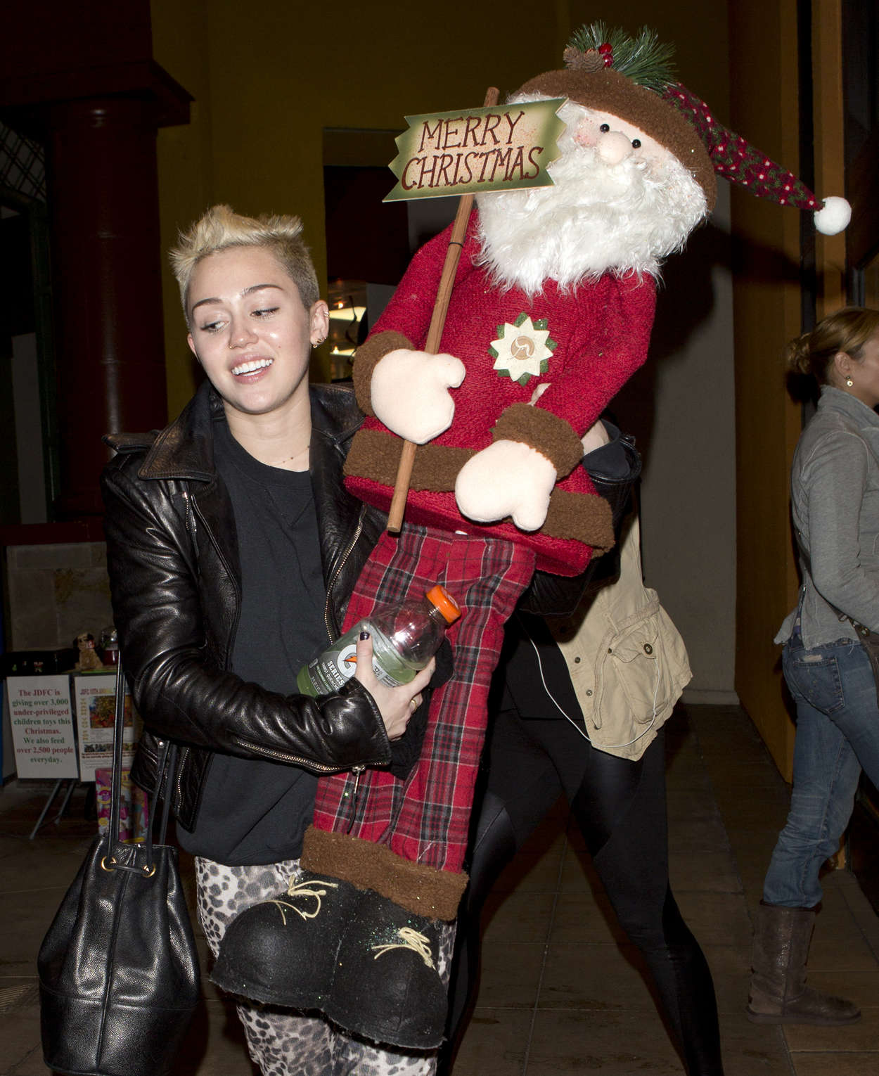 Miley Cyrus - with santa at Xmas shopping candids in Studio City